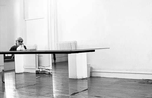 Andy Warhol at Factory Desk